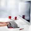 Contour_RollerMouse_Red_desk_screen_props_w_hands_72dpi